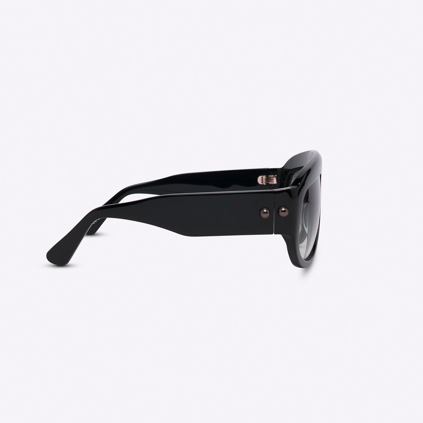 Black oversized aviator sunglasses with bold acetate frame – temple detail on white background