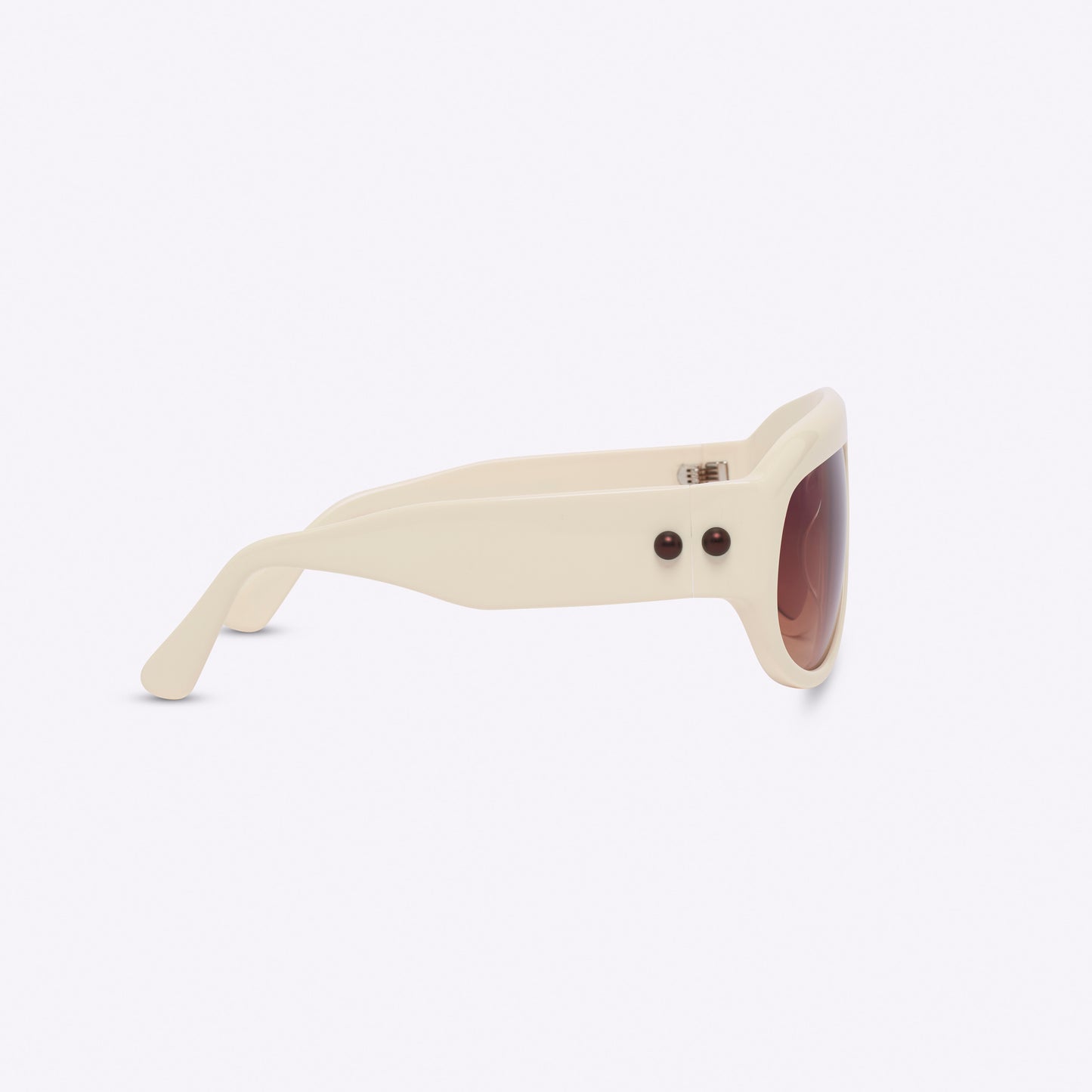 Ivory oversized aviator sunglasses with bold acetate frame – temple detail on white background