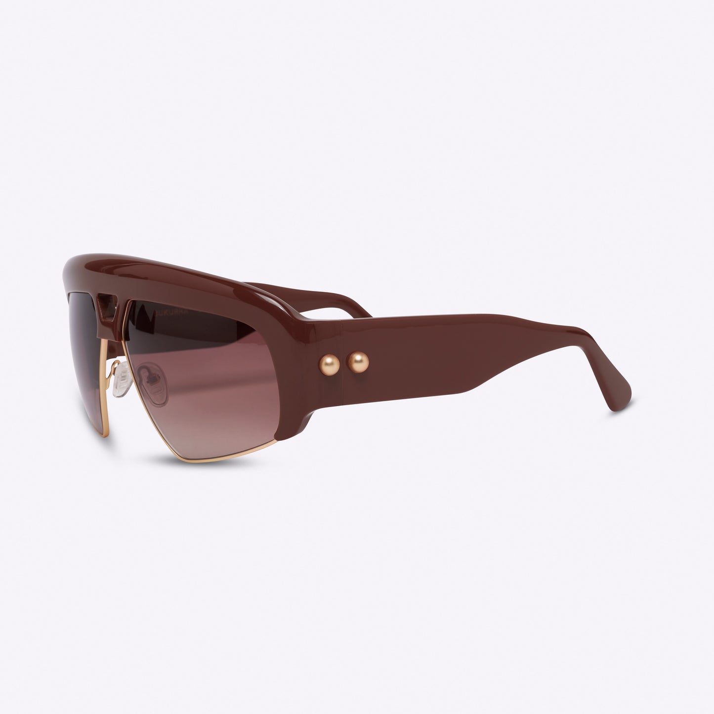 Brown oversized aviator sunglasses with acetate and metal frame – side product view on white background