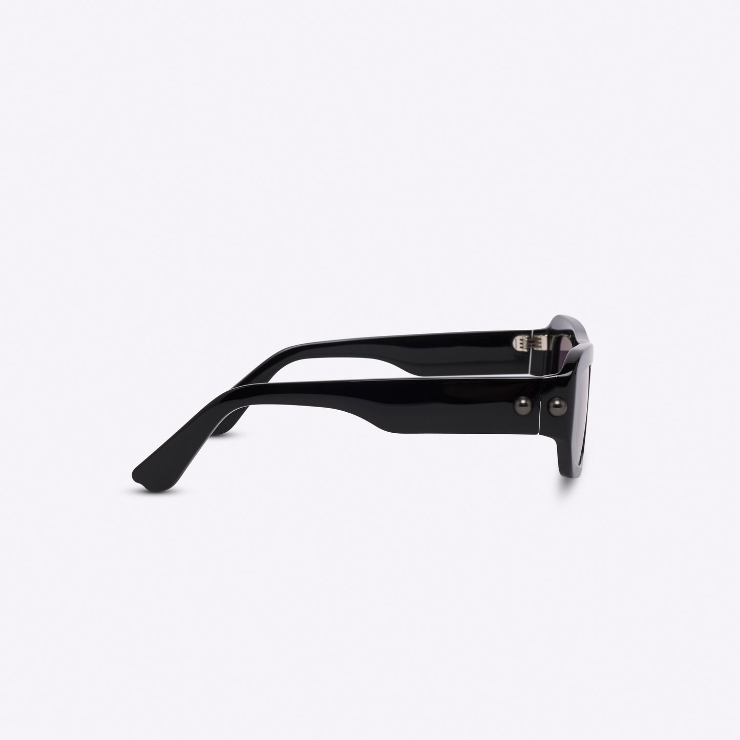 Rectangular black acetate sunglasses – close-up of temple detail and frame side profile