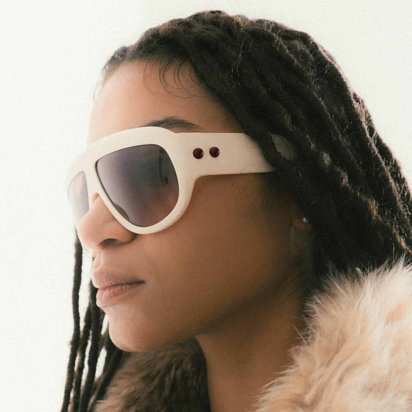 Ivory oversized aviator sunglasses with bold acetate frame – worn by female model – side view portrait