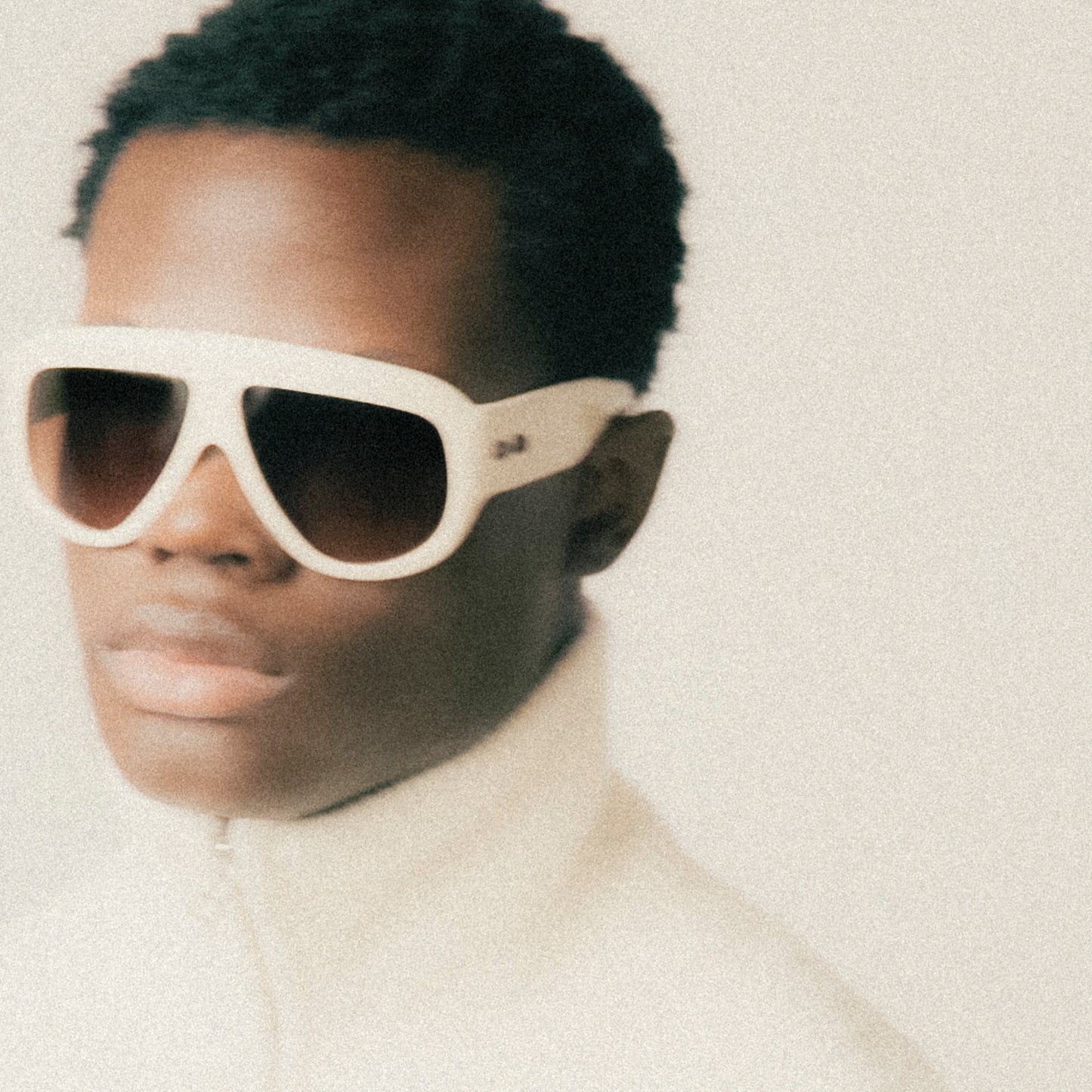 Ivory oversized aviator sunglasses with bold acetate frame – worn by male model – side view portrait