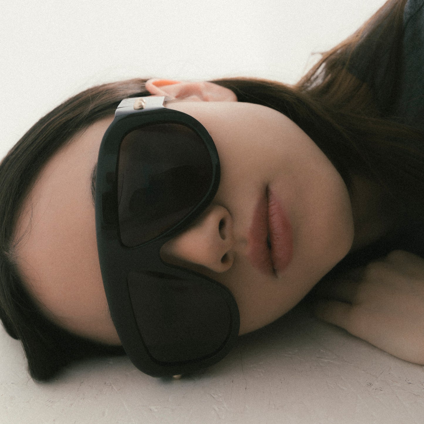 Brown oversized aviator sunglasses with bold acetate frame – worn by female model