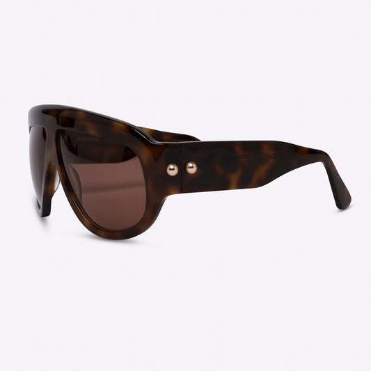Tortoiseshell oversized aviator sunglasses with bold acetate frame – side view on white background