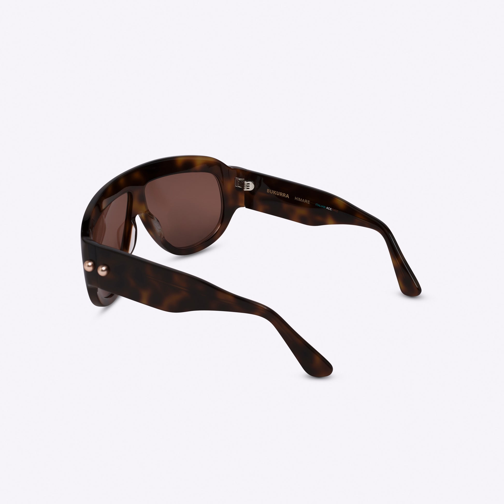 Tortoiseshell oversized aviator sunglasses with bold acetate frame – back view on white background