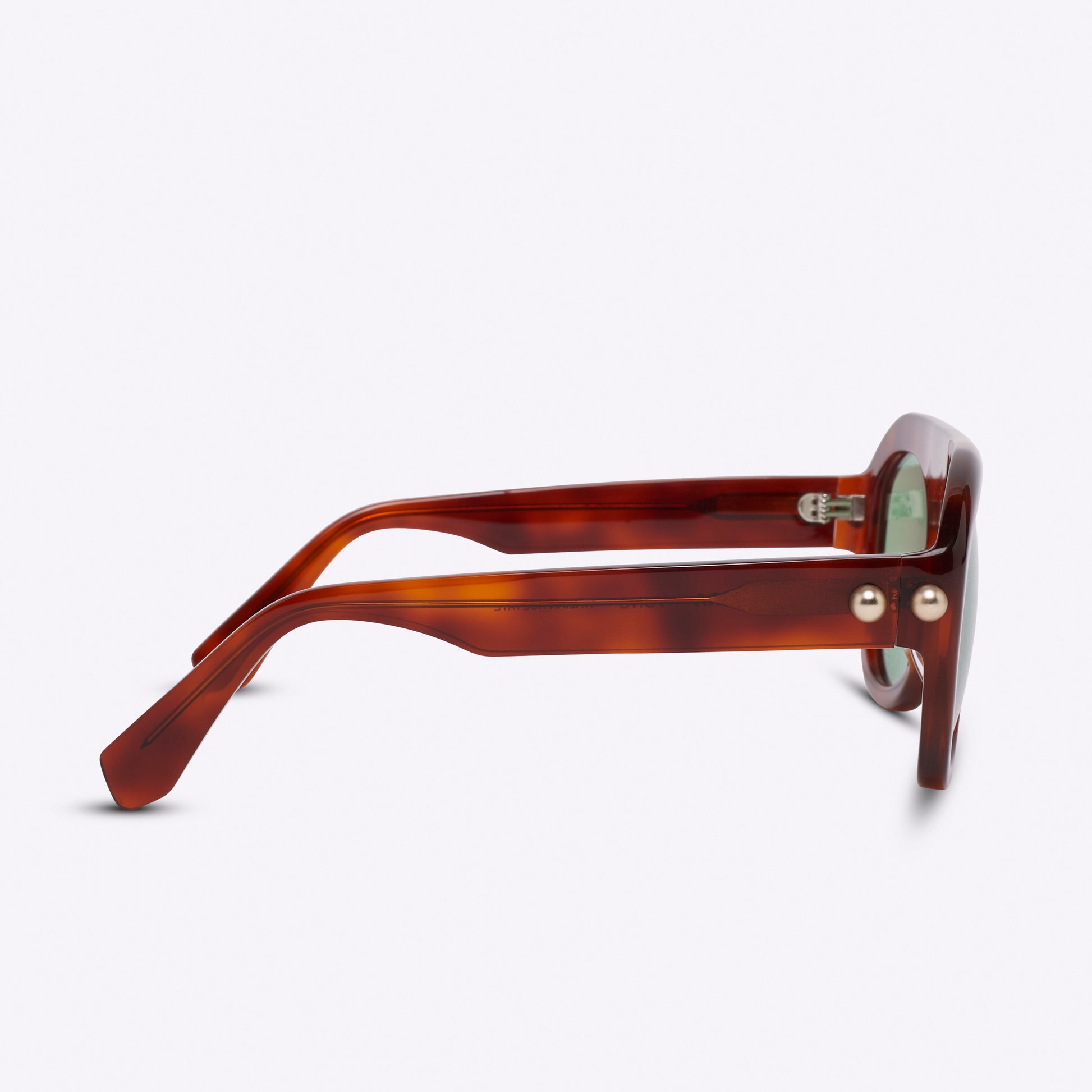 Brown aviator sunglasses in Havana acetate – temple detail view product photo on white background