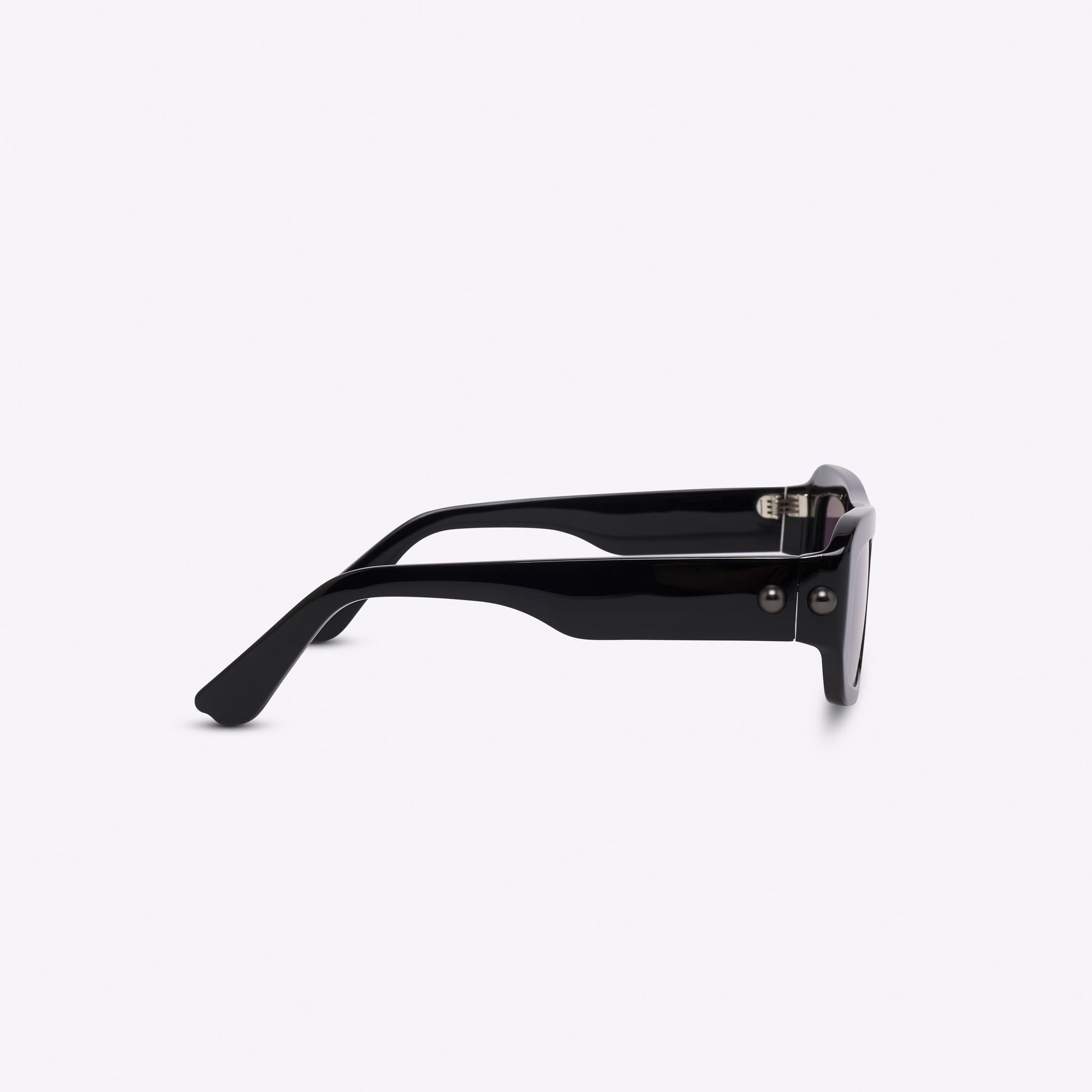 Rectangular black acetate sunglasses – close-up of temple detail and frame side profile