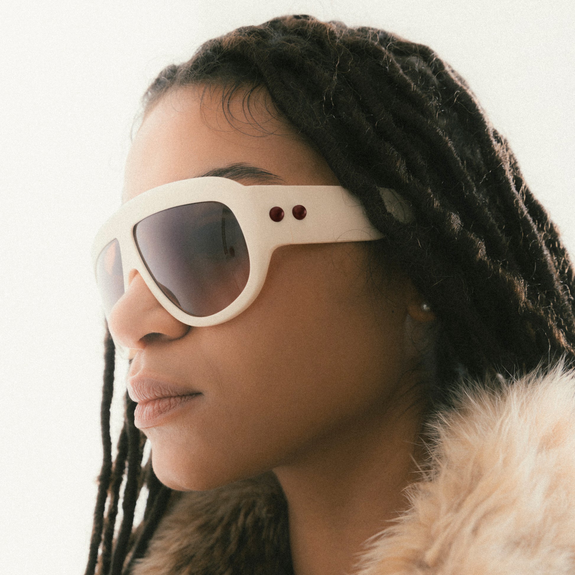 Ivory oversized aviator sunglasses with bold acetate frame – worn by female model  – side view portrait